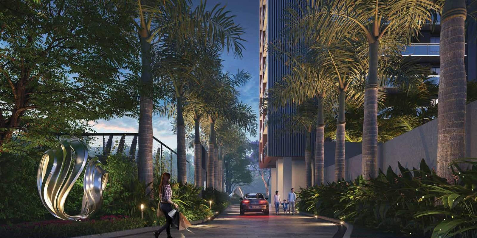 Residents walking the tree-lined landscaped garden walkway at Signum Niva at dusk