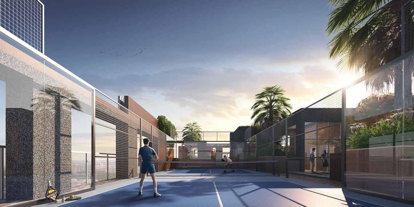 Exclusive rooftop pickleball court at Signum Niva with Kolkata skyline views at dusk